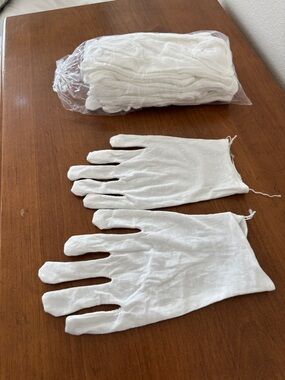 Package of cotton gloves to wear at night for moisturizing